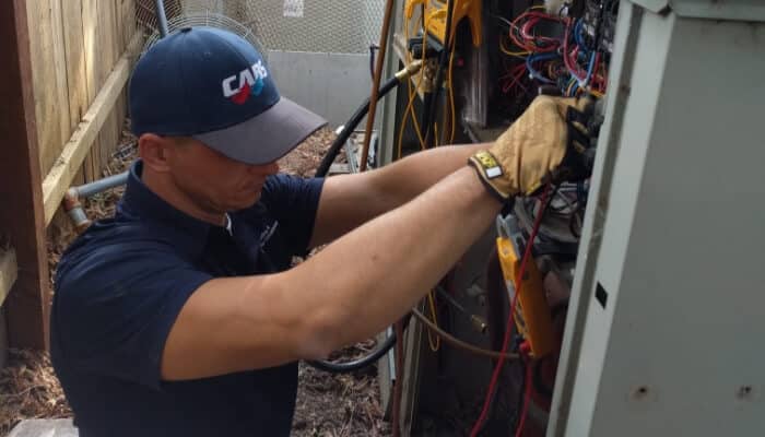 Cabs Technician Working On Ac Unit 1